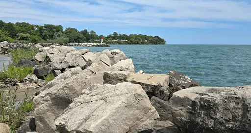 Waterfront dock and Lake Erie shoreline at Erie Shores Cottage Community